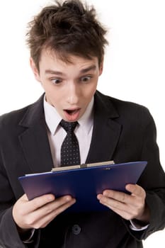Image of shocked businessman looking at document surprisingly with open mouth