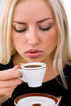 Portrait of pretty woman drinking coffee