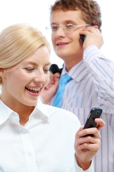 Image of confident woman reading sms with calling businessman on background