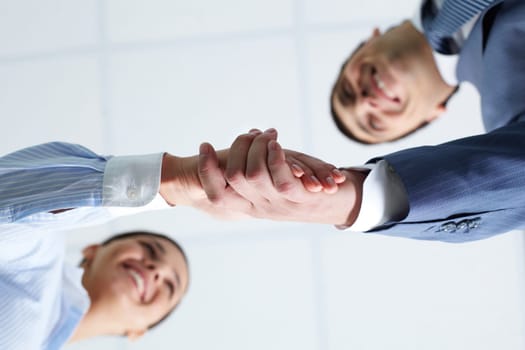 Below view of two handshaking partners