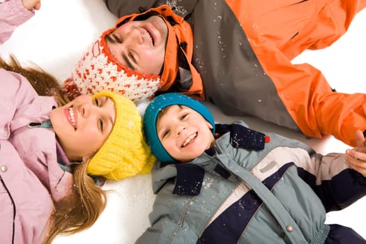 Above angle of happy family looking at camera
