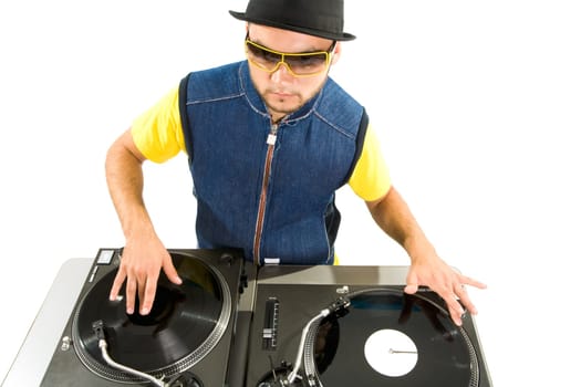 Portrait of smart deejay spinning turntables