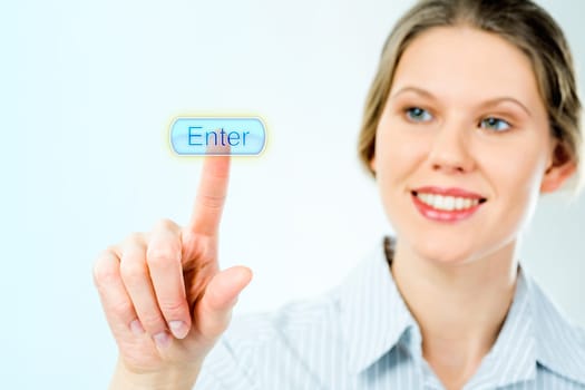 Portrait of businesswoman looking at the enter button and touching it with her forefinger with smile