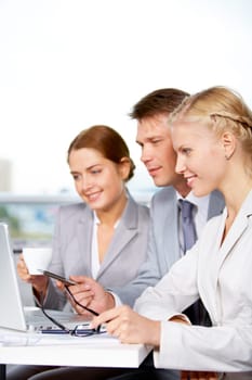 Image of successful businesspeople discussing new project or plan at meeting