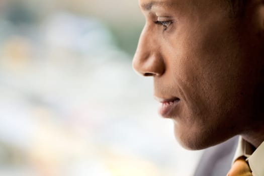 Image of attractive male with pensive expression on his face