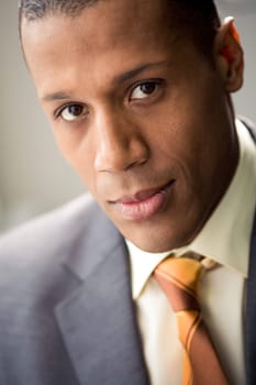 Portrait of confident employer looking at camera with calm expression