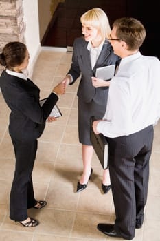 Business people shaking hands making an agreement