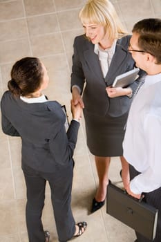 Business people shaking hands making an agreement