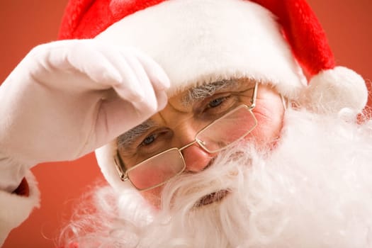 Photo of tired Santa Claus over white background