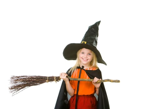 Photo of girl in halloween costume and broom isolated on white background