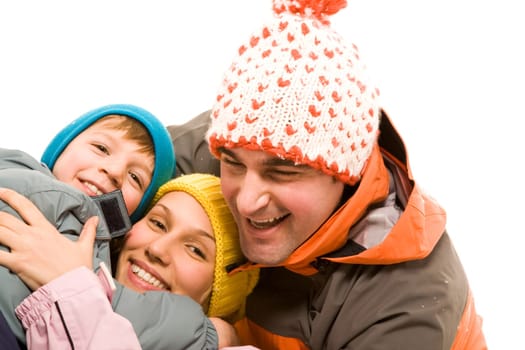 Image of cheerful family looking at camera over white background