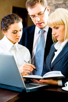 Image of business people discussing a new plan of work