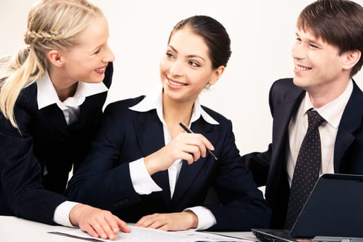 Portrait of working team discussing a new plan together