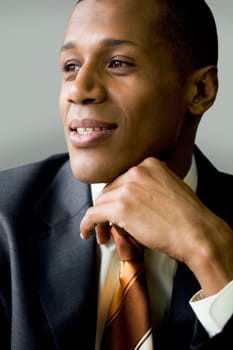 Vertical image of confident businessman looking forwards