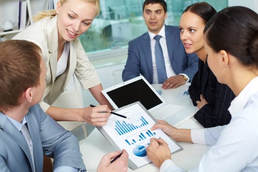 Businesspeople discussing the results of their work