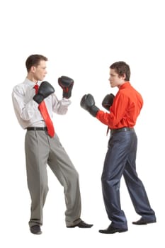 Portrait of two businessmen in boxing gloves fighting