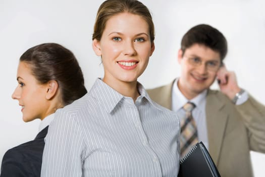 Portrait of  smiling professional on the  background of people