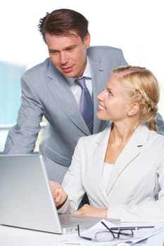 Successful businesswoman explaining something to colleague while they planning work