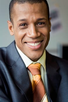 Portrait of attractive man looking at camera and smiling
