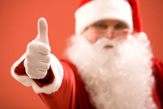 Photo of thumb up shown by Santa Claus