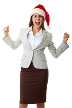Portrait of ecstatic businesswoman in Santa cap shouting in triumph