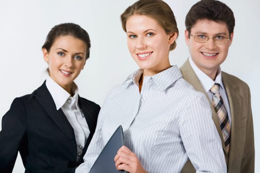 Customary business group of smiling professional over a white background