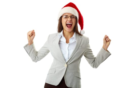 Portrait of ecstatic businesswoman in Santa cap shouting in triumph