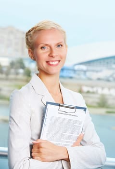 Portrait of elegant businesswoman looking at camera