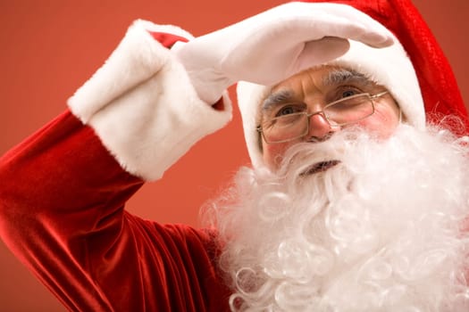 Photo of smart Santa Claus looking forwards