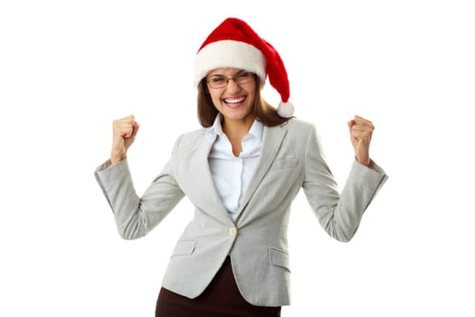 Portrait of ecstatic businesswoman in Santa cap showing her triumph