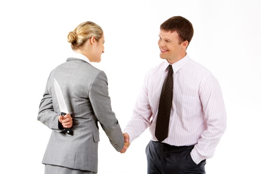 Conceptual image of business woman with knife doing agreement with businessman