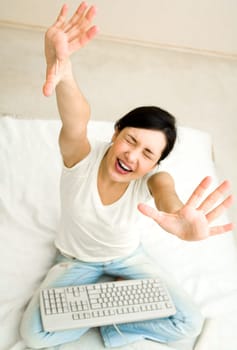 Image of happy girl stretching her arms upwards in joyful mood