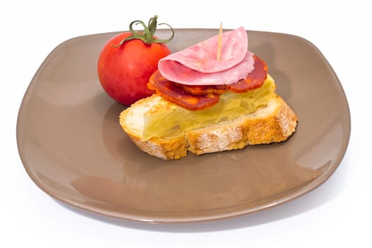 Spanish omelette with chorizo Iberico, typical cover montadito