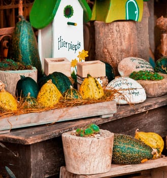 Fall Arrangement with a nesting box and autumn vegetables for decorative concepts