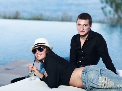 Young couple. Sea on the background