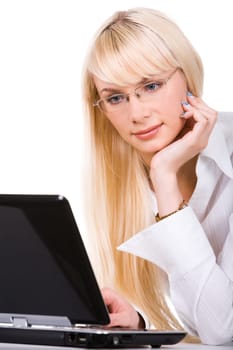 Portrait of lovely lady in front of laptop touching her face