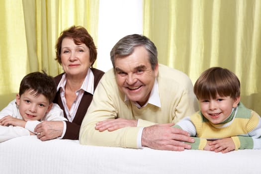 Portrait of grandparents with two their grandsons