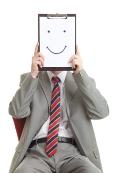 Portrait of businessman holding document with smile near his face