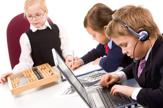 Photo of serious business partners doing their work at meeting
