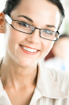 Face of happy business lady looking at camera with smile