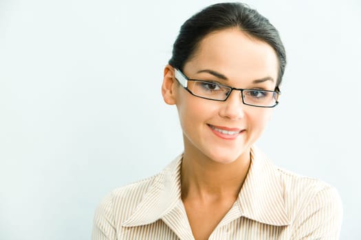 View of clever business woman on a blue background