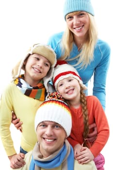 Happy family looking at camera and smiling