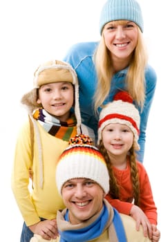 Happy family looking at camera and smiling