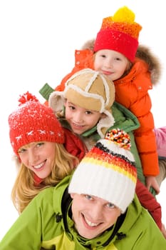 Heap of happy family members looking at camera with smiles