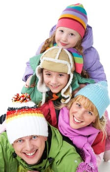 Heap of happy family members looking at camera with smiles