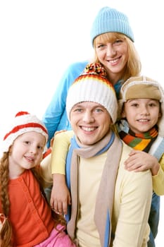 A happy family in winter clothing over white background
