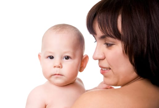 Image of pretty woman with her little baby looking at him on white background
