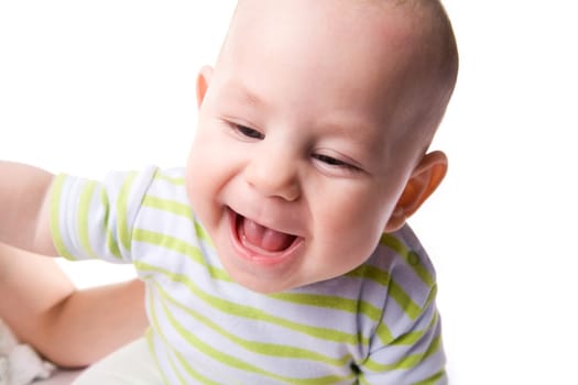 Photo of happy baby laughing over white background
