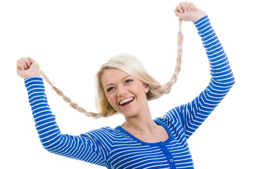 Above view of happy girl with raised arms holding her pigtails over white background
