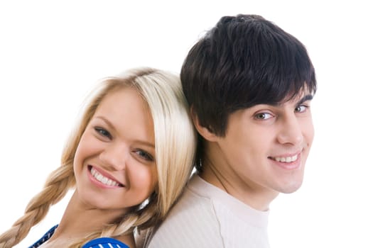 Happy couple looking at camera over white background